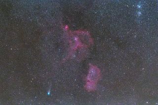 On Aug. 17, 2018, Paul Mortfield captured this spectacular image of Comet 21P passing the Heart and Soul nebulas (IC 1848 and IC 1805) in Cassiopeia. The bright star clusters at the upper right constitute the well-known Double Cluster. This is a 2-minute unguided exposure using a DSLR camera equipped with a 200-mm lens.