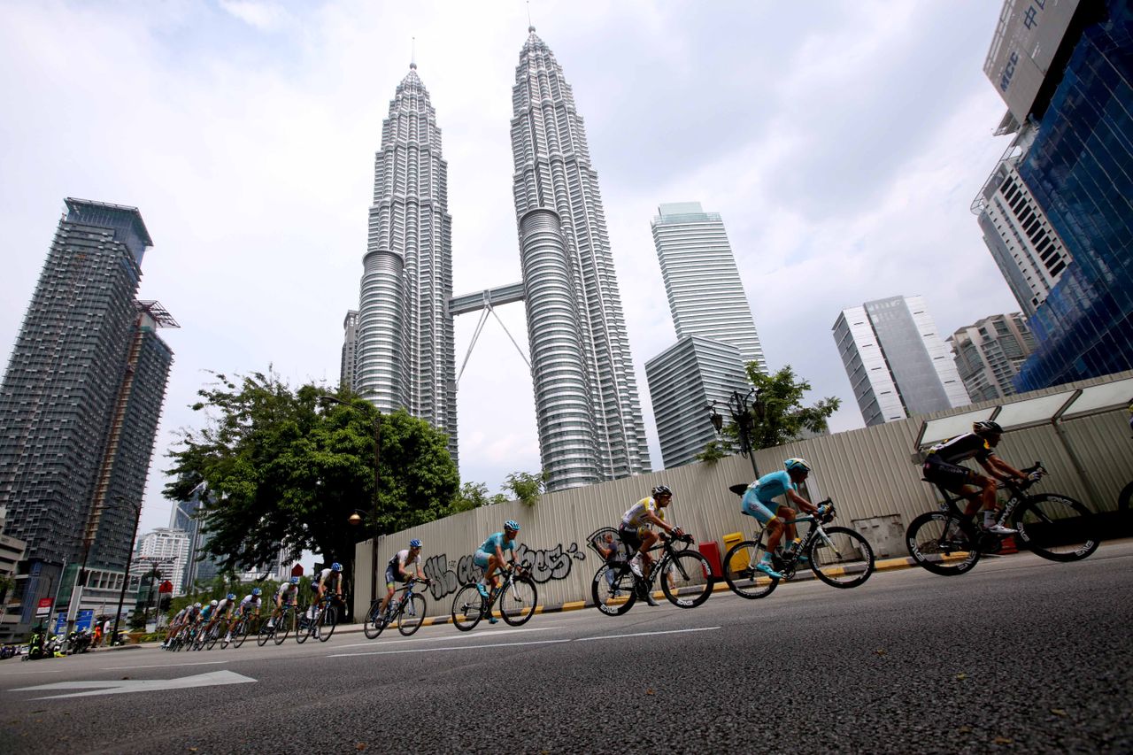 The Petronas Towers stand tall behind the bunch