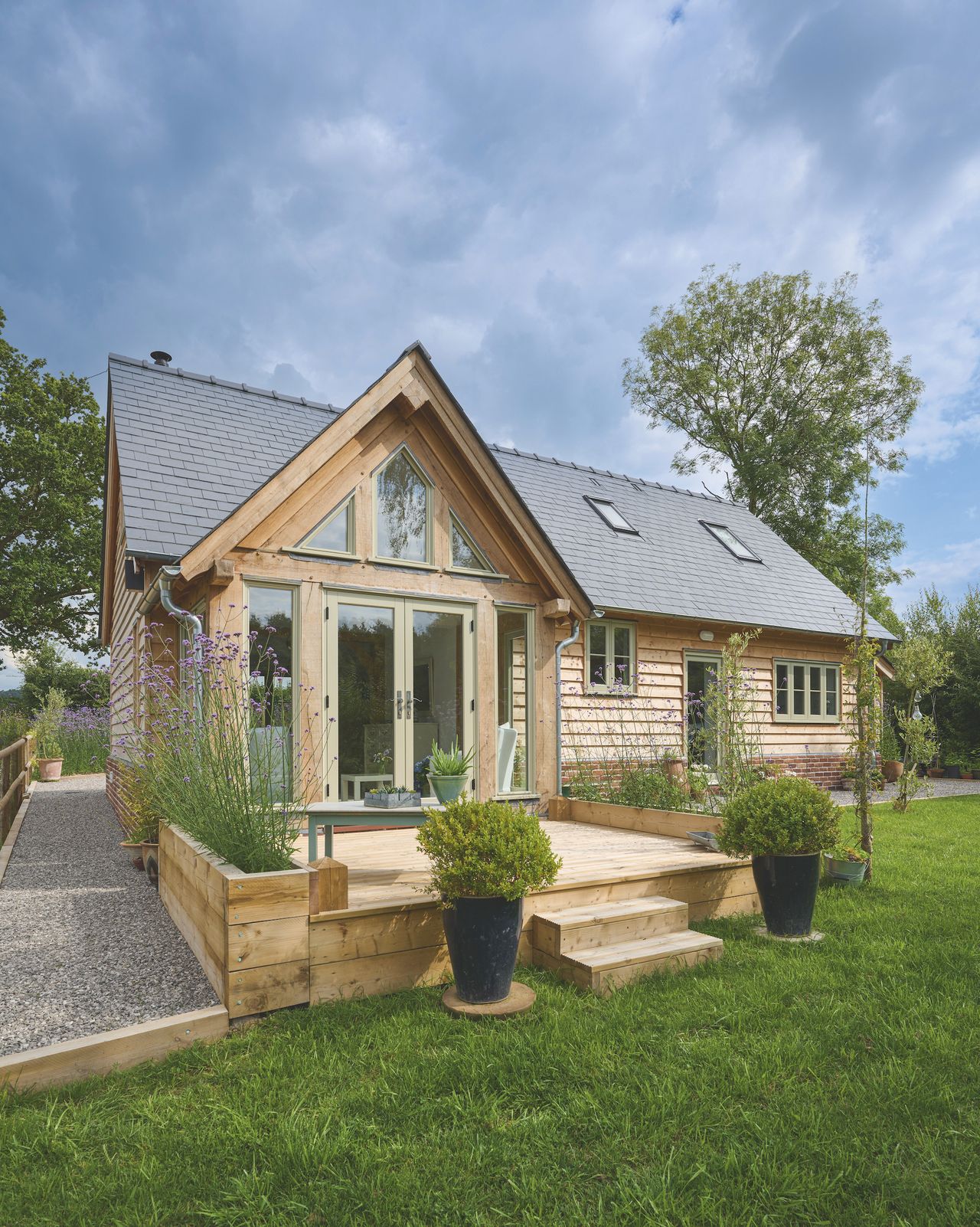 oak frame house with sunroom and patio doors