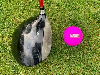 Marvel golf ball address