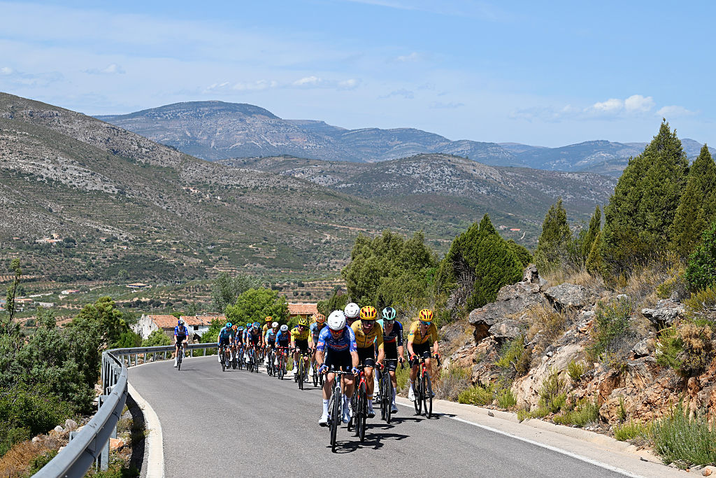 Andreas Kron of Denmark and Team Uno-X Mobility, Leo Bisiaux of France and Team Decathlon CMA CGM and Simon Dalby of Denmark and Team Uno-X Mobility lead the peloton during the La Vuelta - 81st Tour of Spain 2026, Stage 6