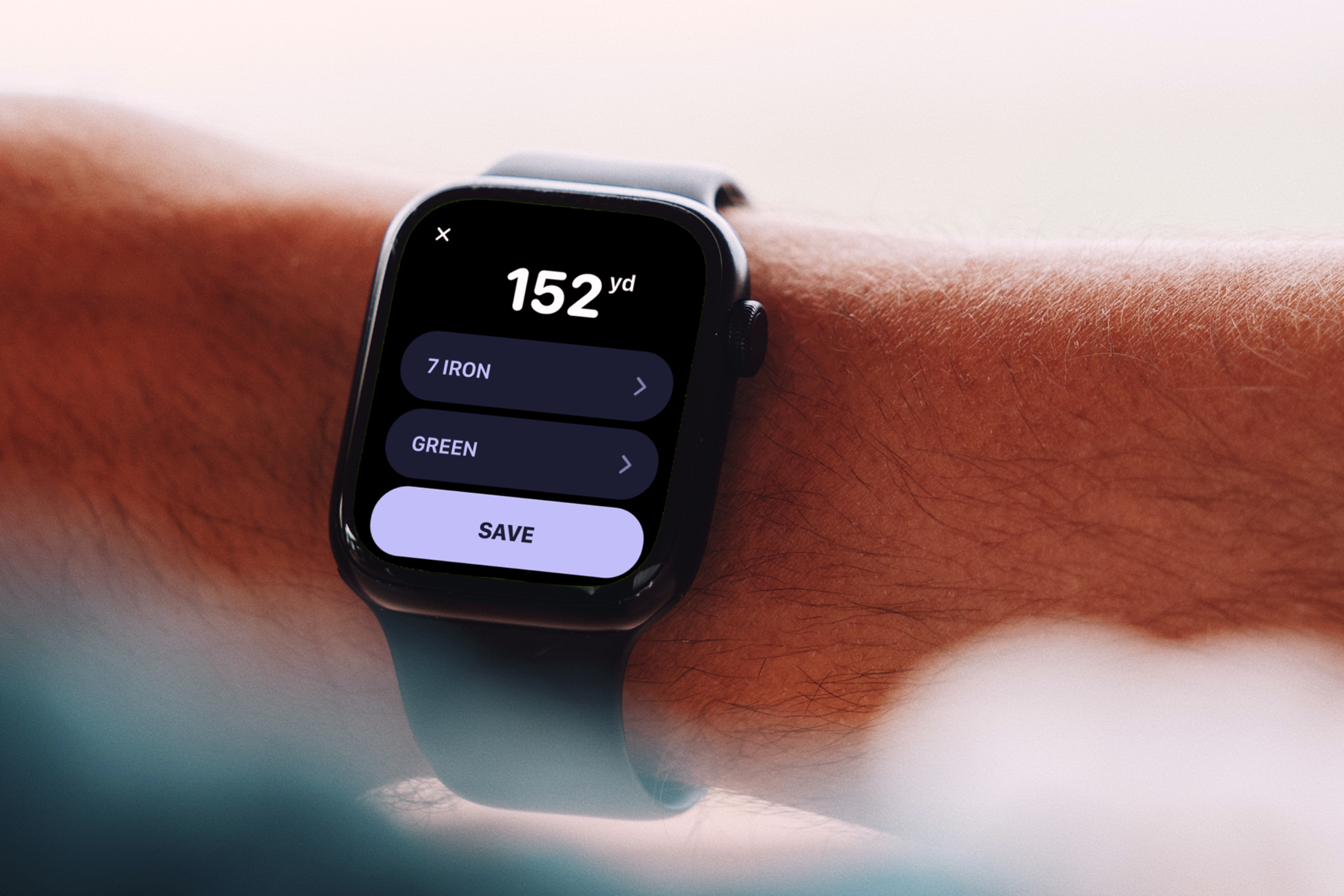 An apple watch seen on a wrist showing Hole19 shot tracking feature