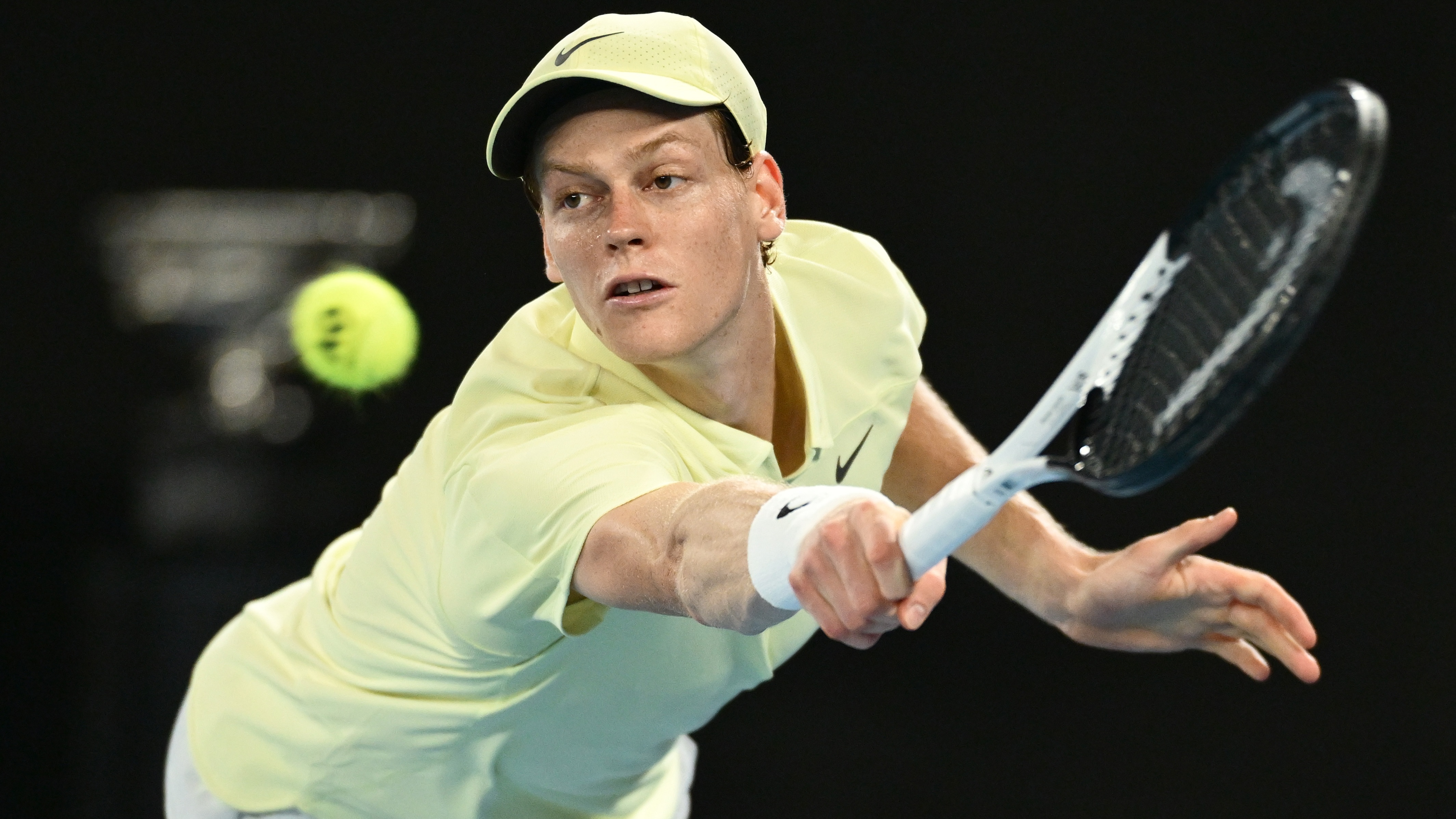 MELBOURNE, AUSTRALIA - JANUARY 26: Jannik Sinner of Italy plays a backhand against Alexander Zverev of Germany in the Men's Singles Final during day 15 of the 2025 Australian Open at Melbourne Park on January 26, 2025 in Melbourne, Australia. 