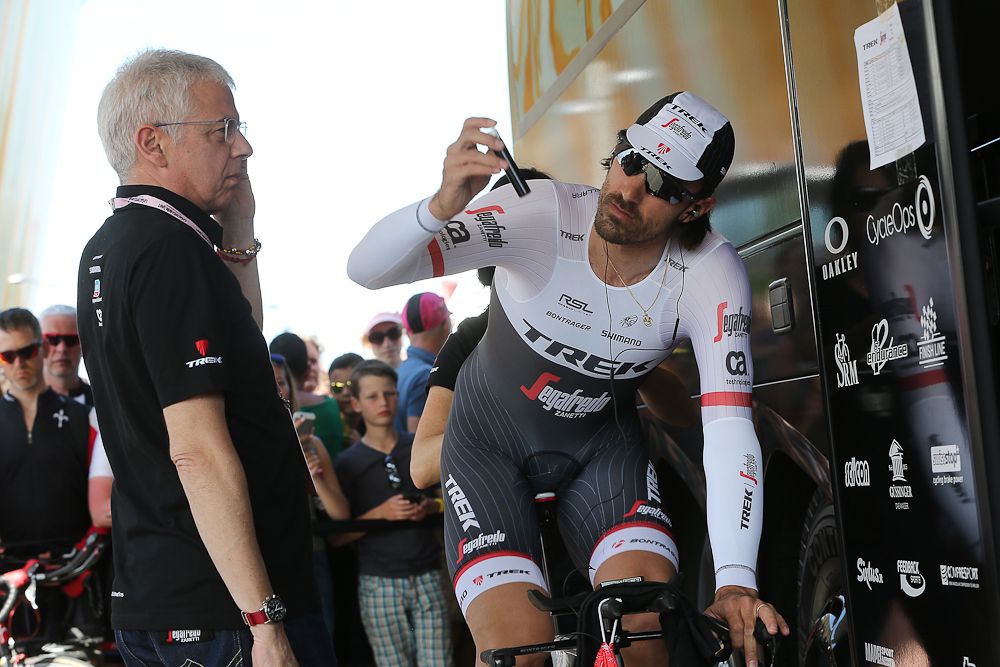 Fabian Cancellara loosens up at the Trek-Segafredo team bus.