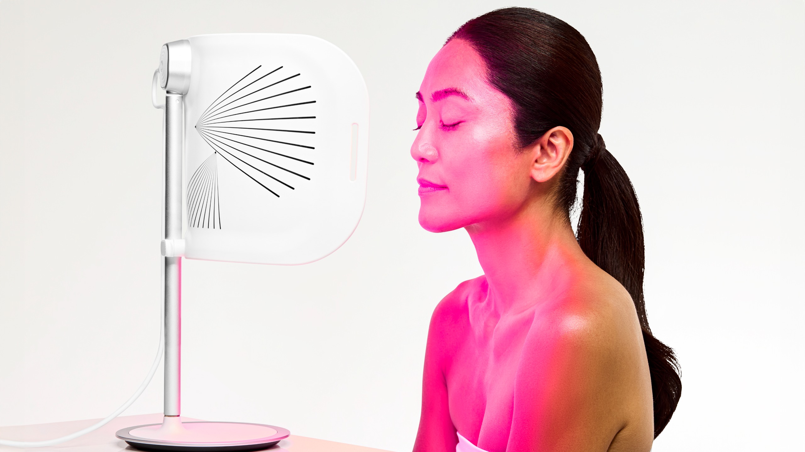 LED light panel switched on with woman using device