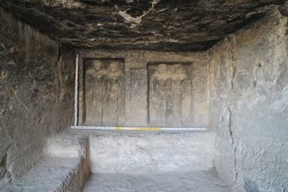 The ancient tomb, possibly for a priest, contains a central room (shown here), with four statues.