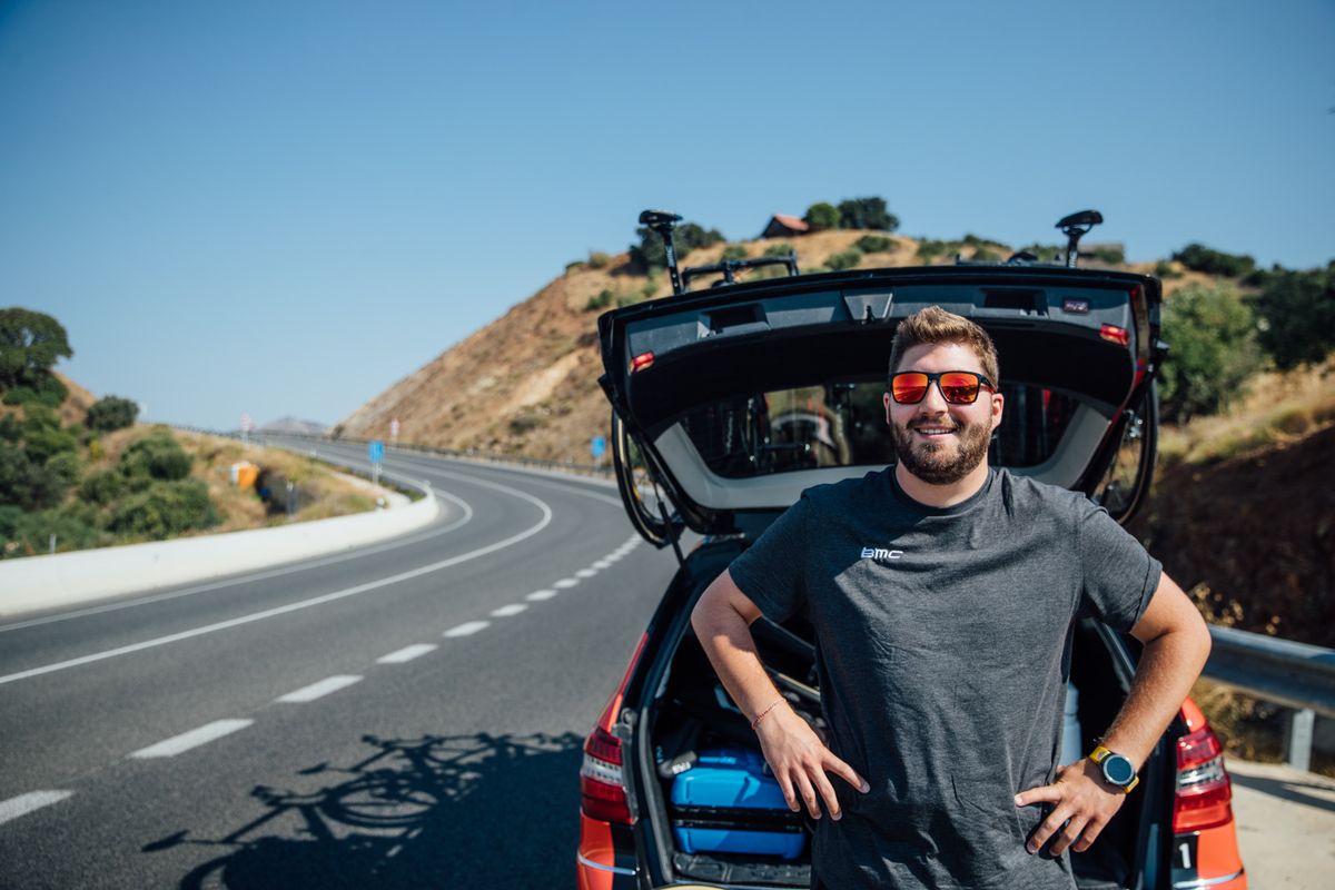 Yuri Feijtel waits for riders at the top of a climb on a pre-race training ride.