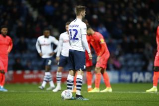 Paul Gallagher prepares to take a penalty for Preston North End against Huddersfield Town by facing away from the goalkeeper in November 2019.