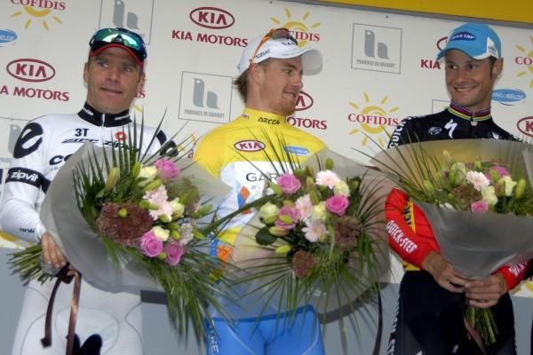 Keeping the local florists busy: Roger Hammond (3rd, Cervelo TestTeam), Tyler Farrar (1st, Garmin-Slipstream) and Tom Boonen (2nd, Quick Step).