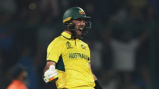 Glenn Maxwell of Australia celebrates a century prior to the Australia vs New Zealand Cricket World Cup match