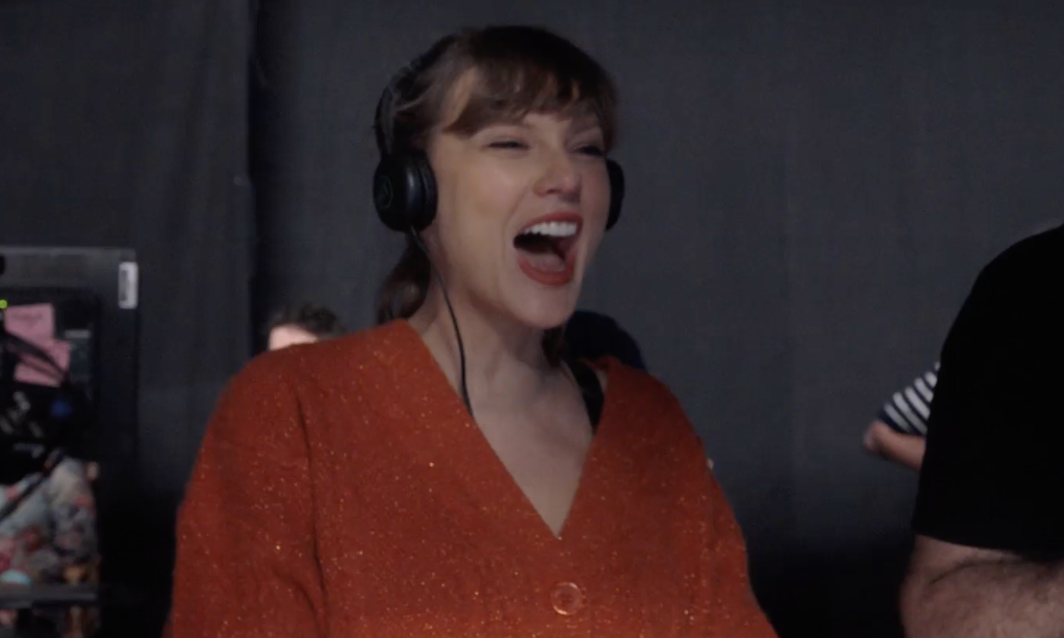 Taylor Swift wore her Life of a Showgirl orange cardigan in a new teaser trailer