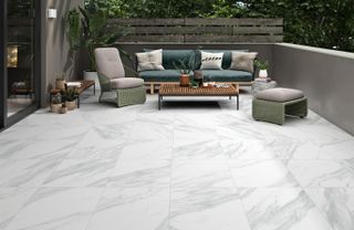 marble effect floor tiles used in a seating area