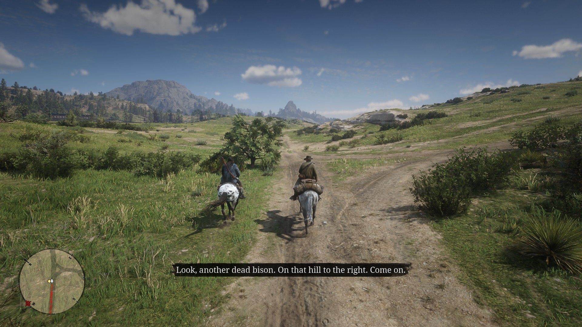 Arthur riding through grasslands with Charles in Red Dead Redemption 2