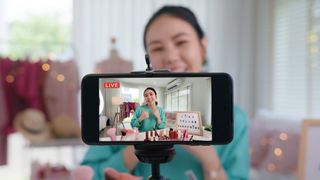 influencer record live viral video camera at home studio.