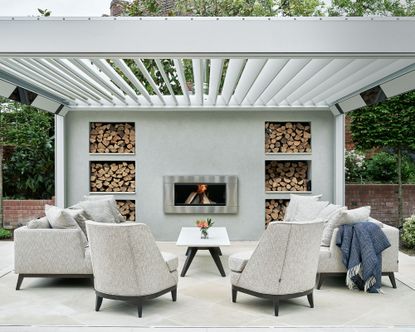 Outdoor fireplace ideas with outdoor seating and pergola