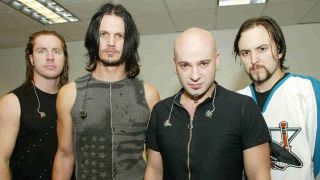 Disturbed posing for a photograph in 2001