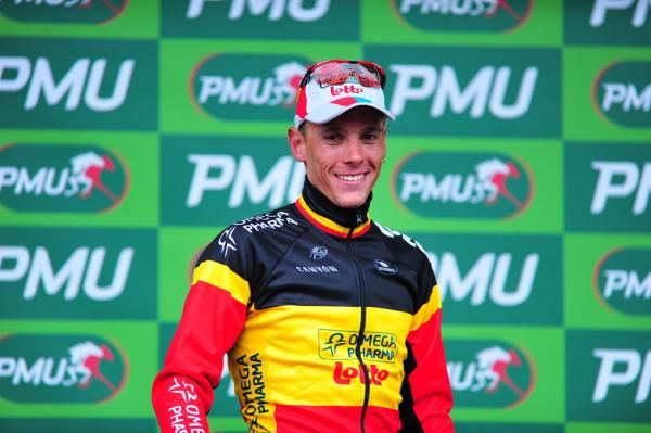 Philippe Gilbert (Omega Pharma-Lotto) smiles on the podium as he waits to be presented with the green jersey.