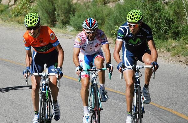 Race leader Xavier Tondo (Movistar), Jose Serpa (Androni - Giocattoli) and Mauricio Soler (Movistar), l-r, climb together to the finish.