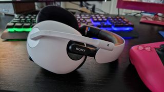 Sony Inzone H7 Review image showing a close-up of the left hand side of the headset with Sony branding and flip-down mic