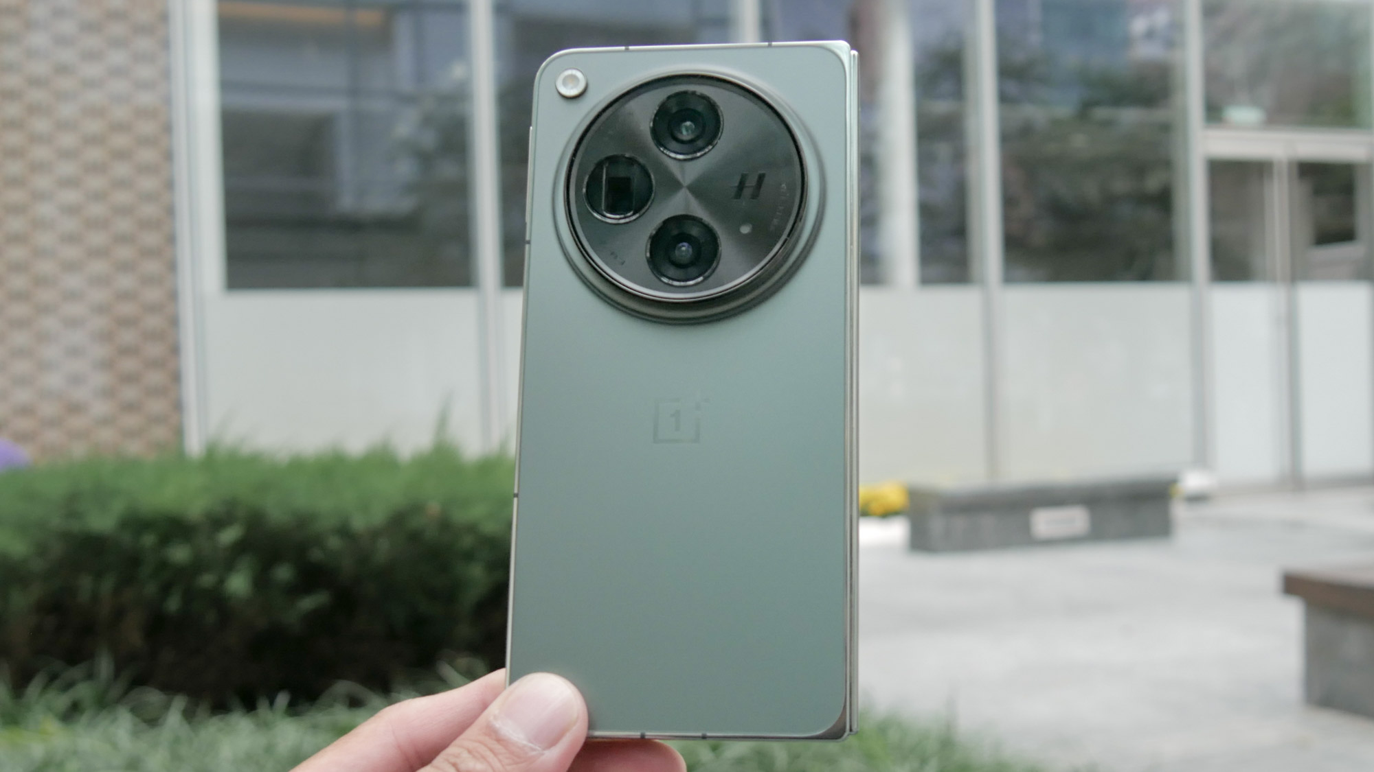 OnePlus Open held in the hand.