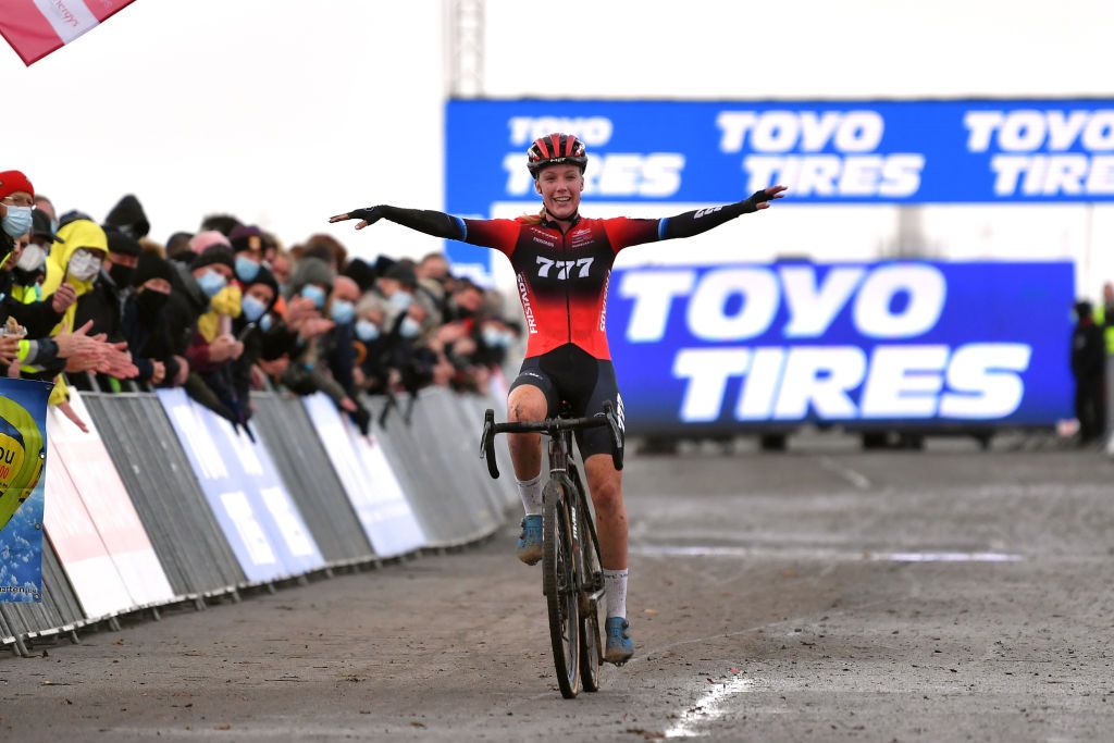 KOKSIJDE BELGIUM NOVEMBER 21 Annemarie Worst of The Netherlands and Team 777 celebrates winning the 50th Koksijde UCI CycloCross Worldcup 2021 Womens Elite CXWorldCup on November 21 2021 in Koksijde Belgium Photo by Luc ClaessenGetty Images