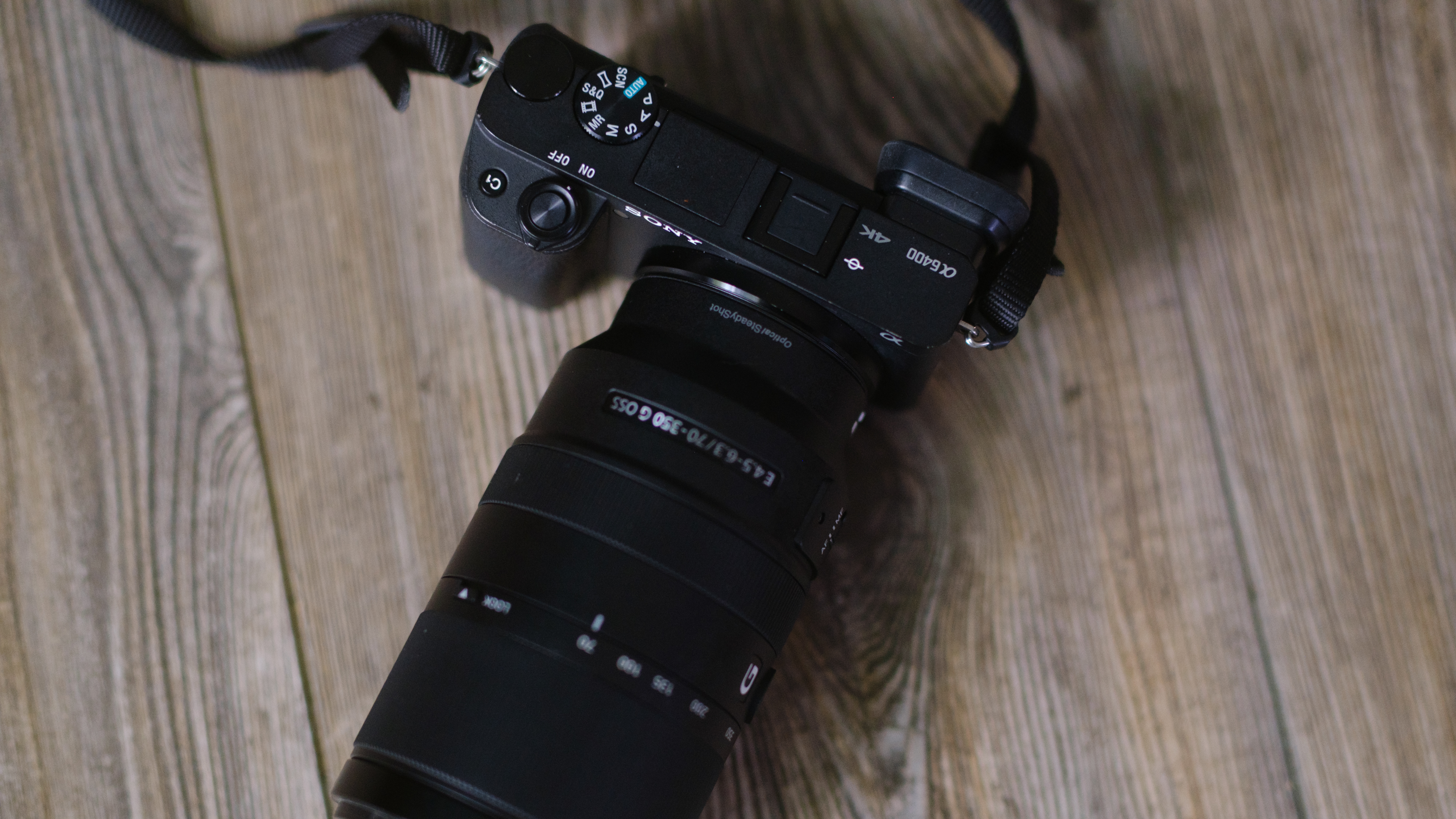 The Sony A6400 on a wood background