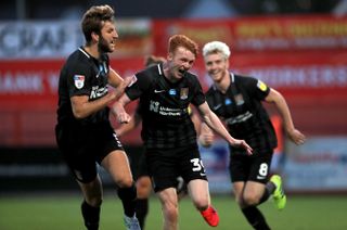 Callum Morton hit a brace as the Cobblers overturned a 2-0 defeat to secure their Wembley place.