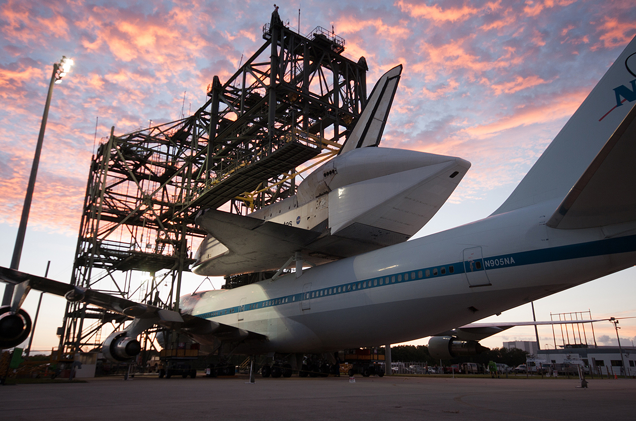 Space shuttle Endeavour is seen at the Kennedy Space Center in Florida atop NASA&#039;s modified Boeing 747 Shuttle Carrier Aircraft (SCA) at sunrise on Sunday, Sept. 16, 2012. 