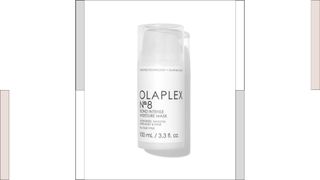 A white cylindrical pot of Olaplex No.8 Bond Intense Moisture Mask with a white lid, with colored columns to the side