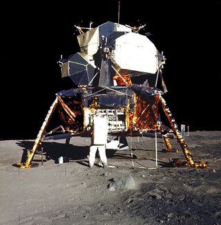 Buzz Aldrin in front of the Apollo 11 lunar module. Kim Stanley Robinson drew some inspiration from the Apollo missions for his new book, "Red Moon." 
