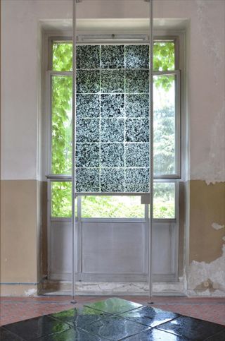 Installation of recycled glass tiles at Alcova, Milan Design Week 2022