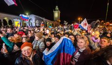 People celebrating in a square in Crimea