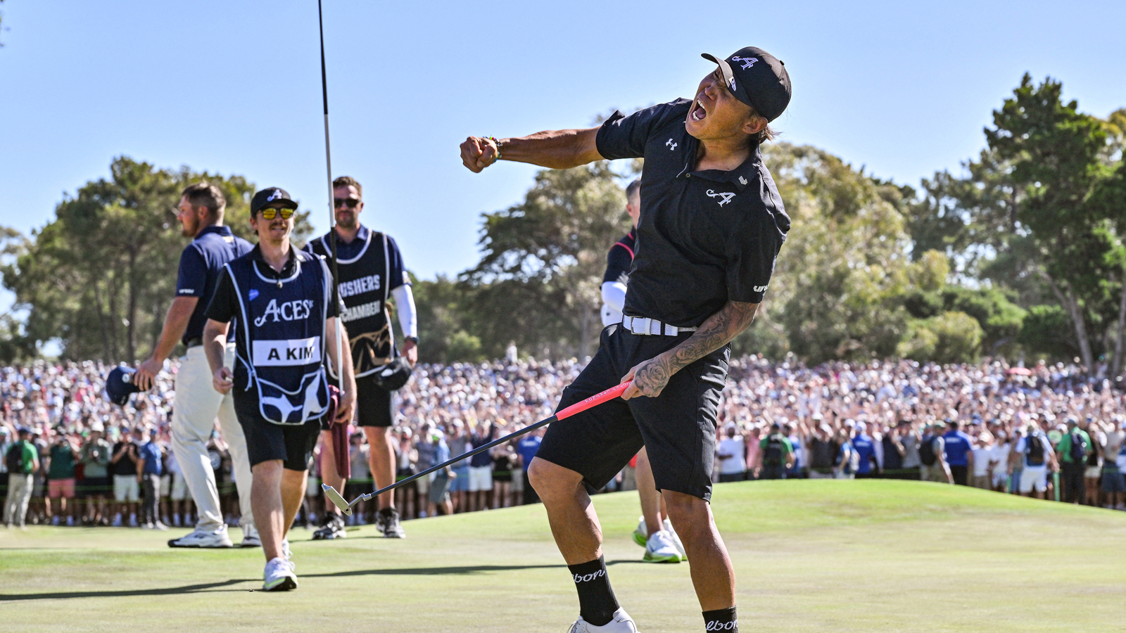 Anthony Kim celebrates victory on the 18th green during LIV Golf Adelaide