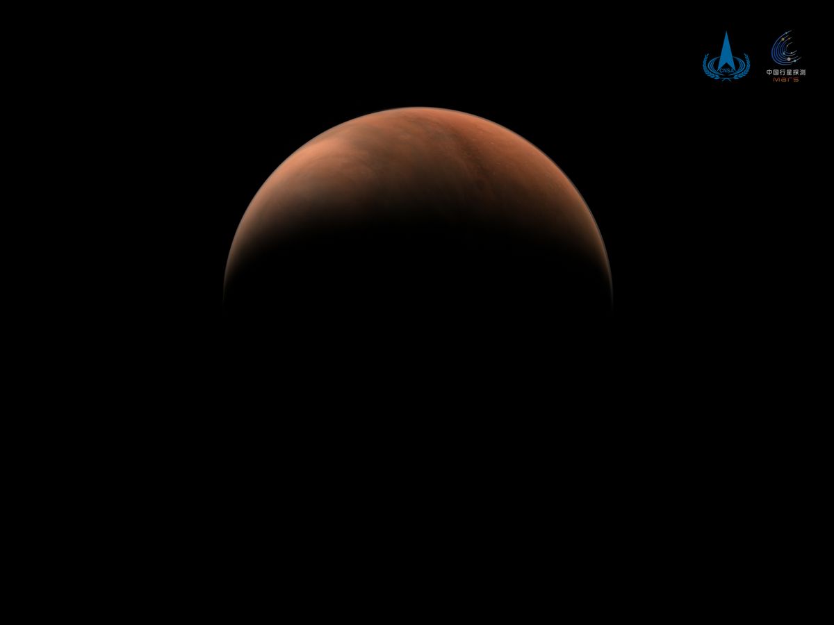 China&#039;s Tianwen-1 spacecraft orbiting Mars captured this stunning view of a crescent Red Planet on March 18, 2021. Shown here is the planet&#039;s northern hemisphere from a distance of 6,850 miles (11,000 kilometers).