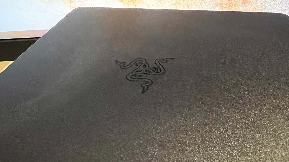 A Razer Leviathan V2 on a desk in front of a monitor