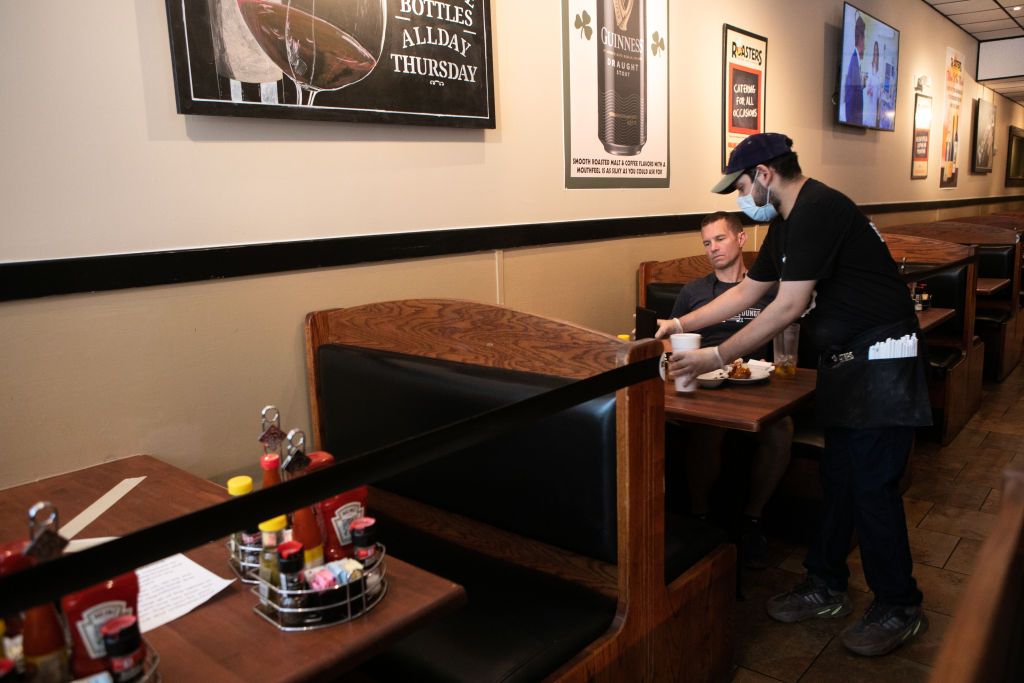 A man is served at an Atlanta restaurant.