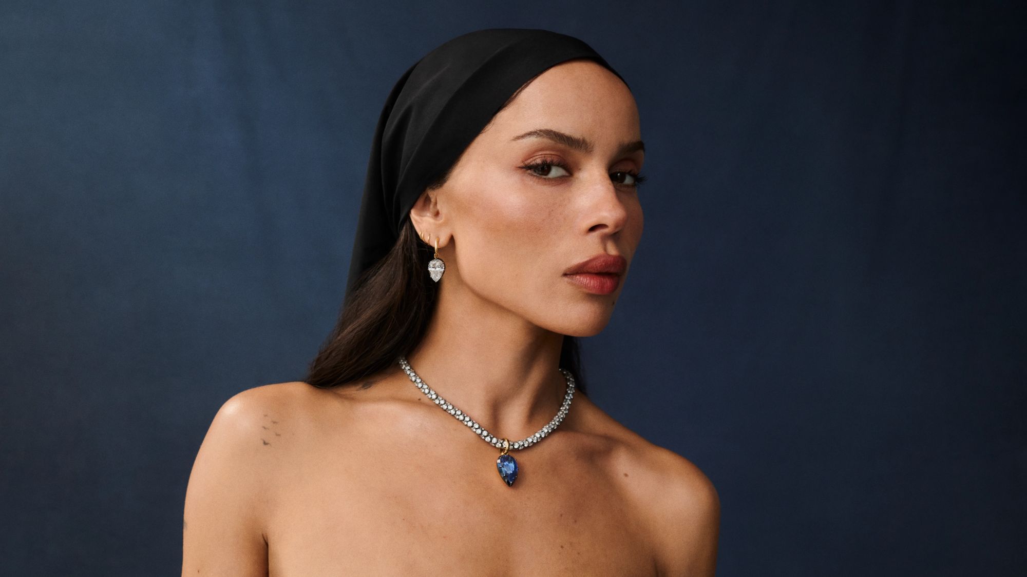 zoe kravitz posing in diamond jewellery from jessica mccormack