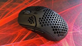 HyperX Pulsefire Haste Wireless review: gaming mouse on red and black background
