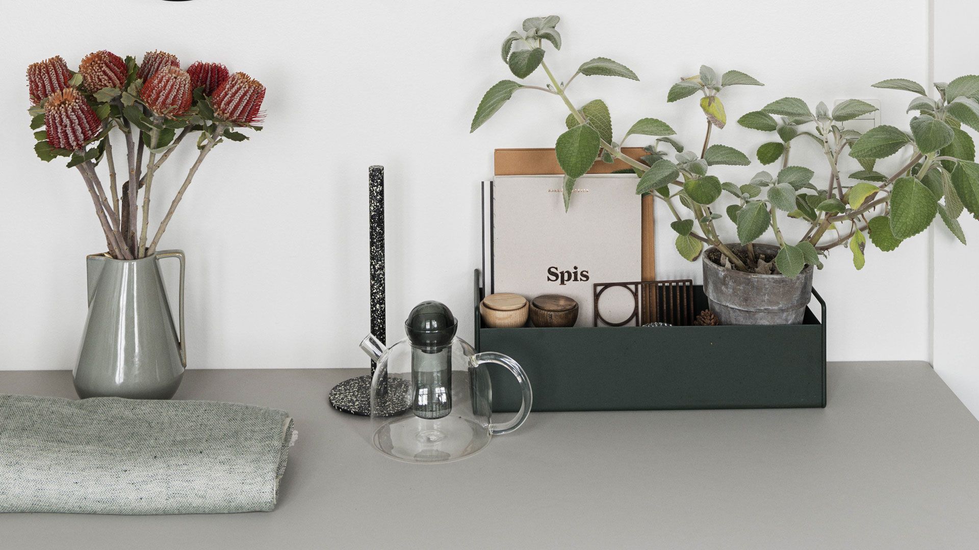 organizing kitchen countertops with storage basket