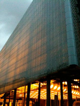 A close-up of a facade mad with Polli Bricks.