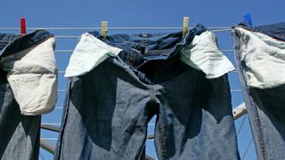 Jeans hanging on a washing line