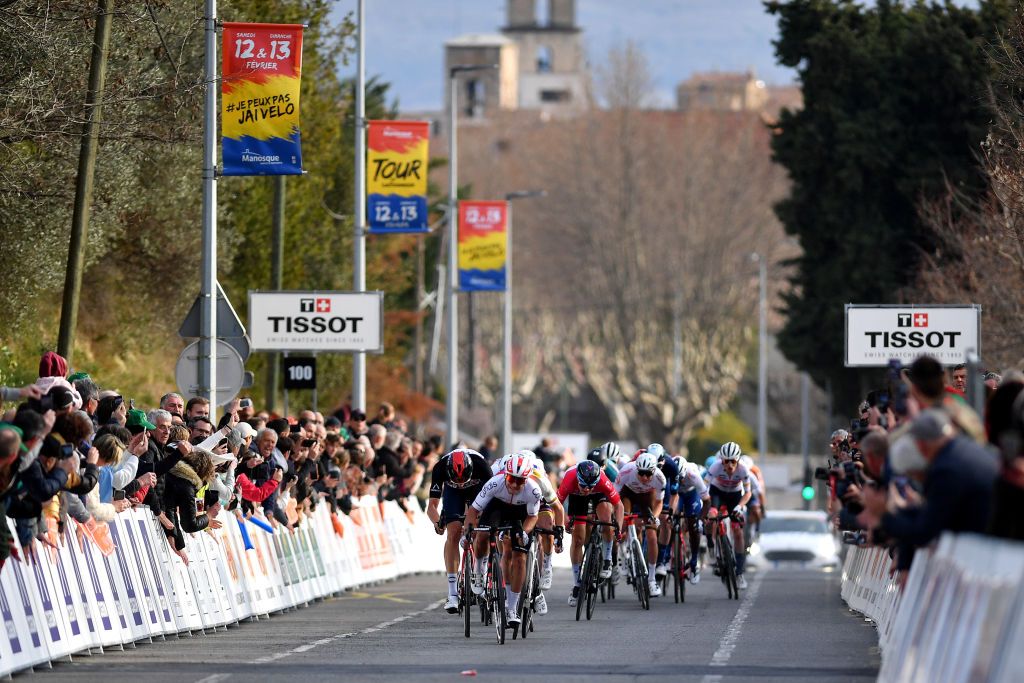 MANOSQUE FRANCE FEBRUARY 12 A general view of Bryan Coquard of France and Team Cofidis Julian Alaphilippe of France and Team QuickStep Alpha Vinyl Brown Points Jersey and Filippo Ganna of Italy and Team INEOS Grenadiers Black Leader Jersey sprint to win during the 6th Tour de La Provence 2022 Stage 2 a 1806km stage from Arles to Manosque 417m TDLP22 on February 12 2022 in Manosque France Photo by Luc ClaessenGetty Images