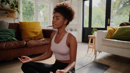 Powerful daily affirmations: A woman meditating