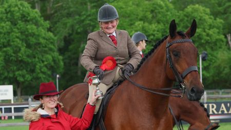 Braithwaite Countryman and Denise Morton stand for a photo after winning the 2026 Windsor ridden Cleveland Bay class