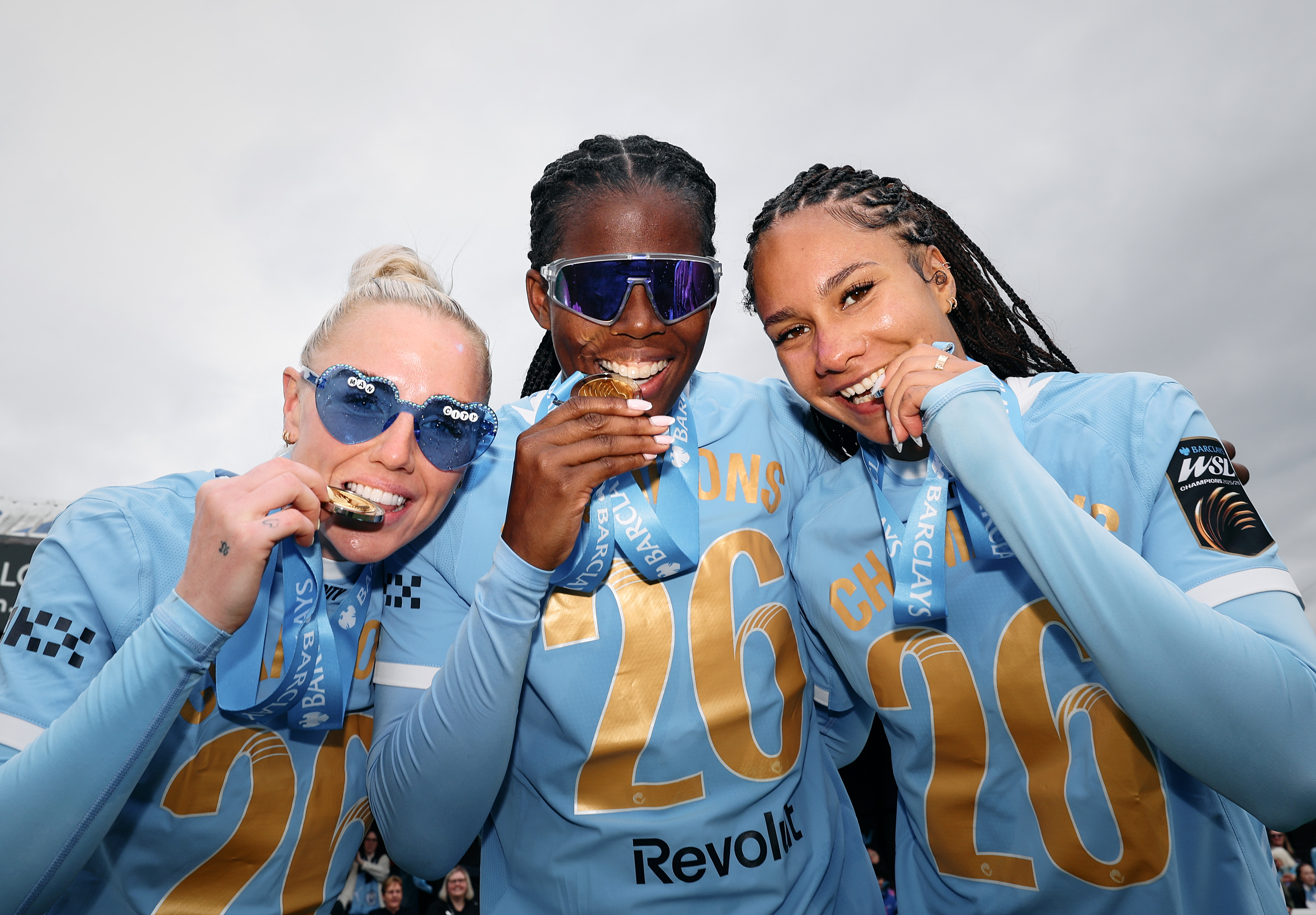 Captain Alex Greenwood (L), Jade Rose (R) and Khadija Shaw of Manchester City celebrate after the Barclays Women's Super League match between West Ham United and Manchester City on May 16, 2026