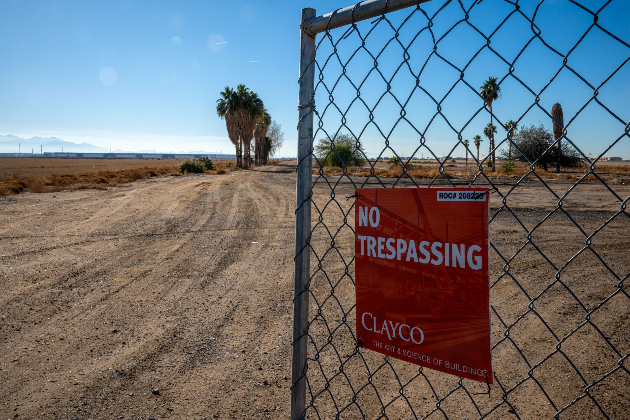 data center construction site in arizona desert with no trespassing sign