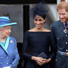 london, england july 10 l r queen elizabeth ii, meghan, duchess of sussex, prince harry, duke of sussex watch the raf flypast on the balcony of buckingham palace, as members of the royal family attend events to mark the centenary of the raf on july 10, 2018 in london, england photo by chris jacksongetty images