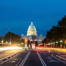 The United States Capitol building at night in Washington DC, USA.