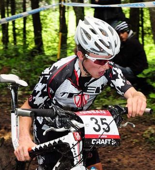 Lukas Flückiger got some practice running with his bike during the mountain bike season.