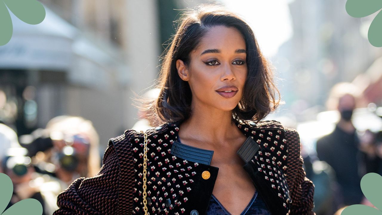 The actor Laura Harrier with a boyfriend bob, having her photograph taken at Paris fashion week 